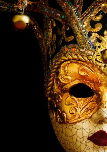 An elegant Venetian mask with gold detailing, a reflection of Italy’s rich culture and craftsmanship.